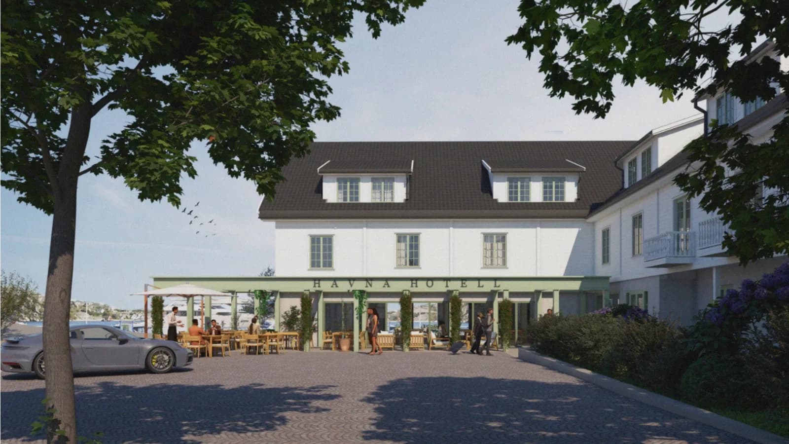 Brygga ved Havna Hotell med RIB-en klar til avgang